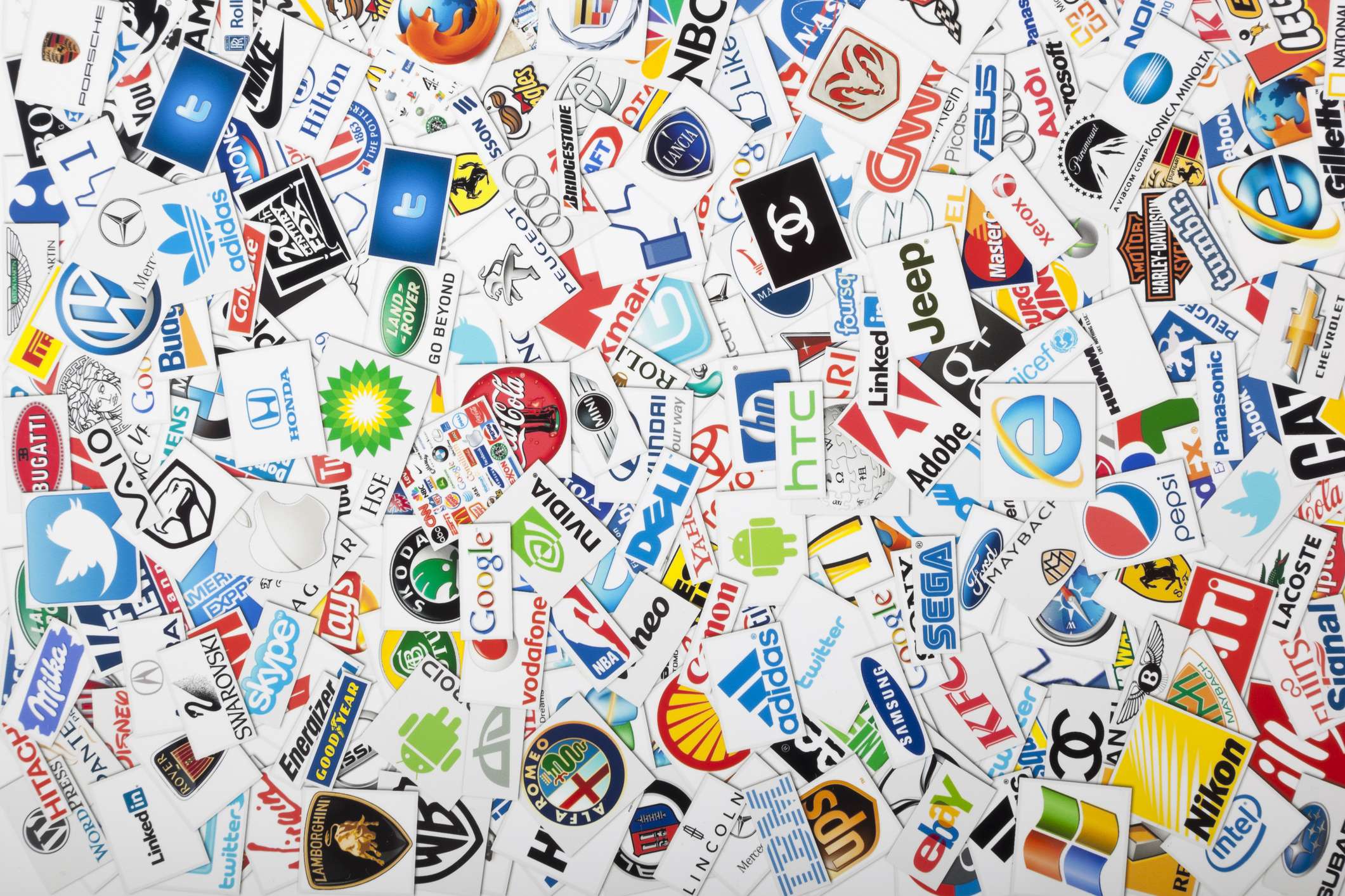 Recognizable Brand Logos and Visual Identity A collage of recognizable brand logos arranged on overlapping cards, illustrating the role of logos in brand recognition and visual identity.